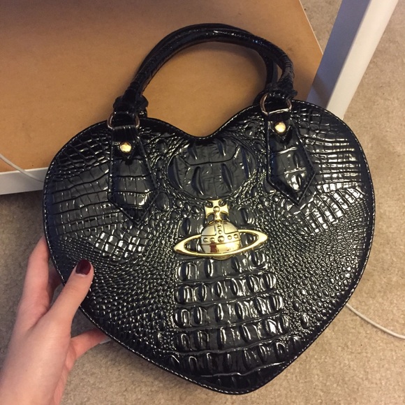 Handbags - Saturn heart shape alligator skin handbag